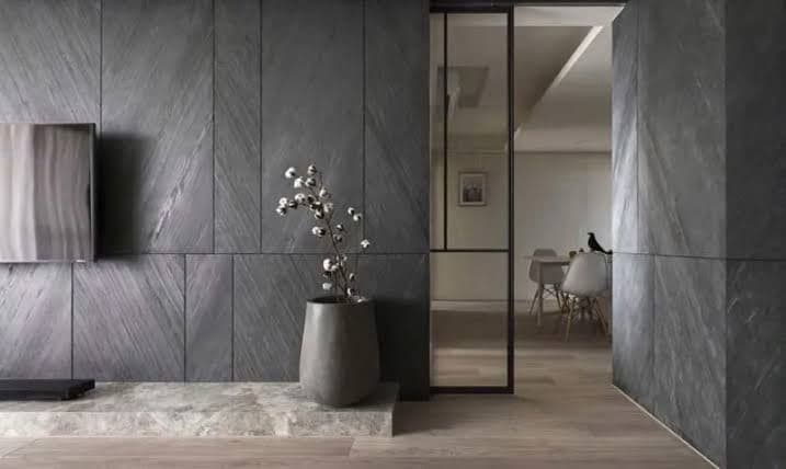 Indoor-outdoor living area with tropical view